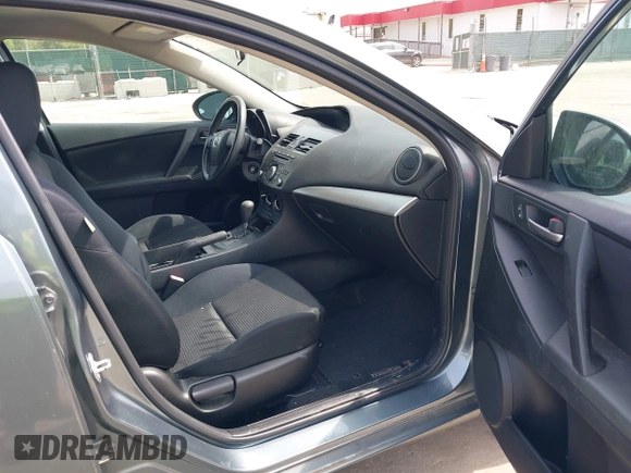 2012 Mazda 3 i Sport with VIN JM1BL1UF1C1548558, listed as a IAAI auction lot 42113245 with 143,667 mi miles and . Bid and sale history available at DreamBid. Image 5.