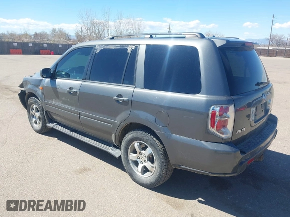 2007 Honda Pilot EX-L with VIN 2HKYF185X7H511879, listed as a IAAI auction lot 41872915 with 232,543 mi miles. Bid and sale history available at carsss.com. Image 3.