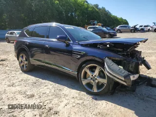 2023 Genesis GV80 with VIN KMUHCESC7PU121865, listed as a Copart auction lot 57990365 with Not provided miles and Salvage title. Bid and sale history available at DreamBid. Image 4.