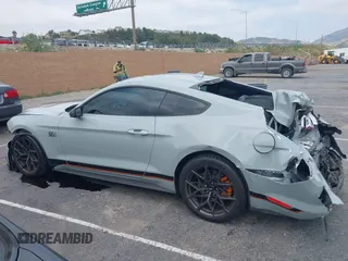 2022 Ford Mustang Mach 1 with VIN 1FA6P8R08N5552580, listed as a IAAI auction lot 42140418 with 14,383 mi miles and . Bid and sale history available at DreamBid. Image 14.