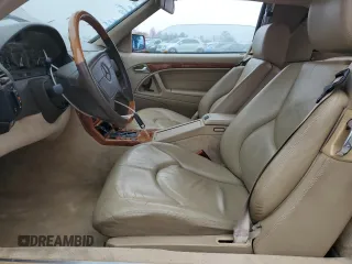 1997 Mercedes-Benz SL-Class with VIN WDBFA67F7VF154440, listed as a Copart auction lot 89329915 with 142,966 mi miles and Salvage Title. Bid and sale history available at carsss.com. Image 7.