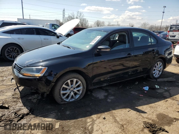 2012 Volkswagen Jetta SE with VIN 3VWDP7AJ4CM346564, listed as a Copart auction lot 52766775 with 157,384 mi miles and Salvage title. Bid and sale history available at DreamBid. Image 1.