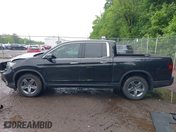2021 Honda Ridgeline RTL-E with VIN 5FPYK3F75MB015370, listed as a IAAI auction lot 42253586 with 84,188 mi miles and . Bid and sale history available at DreamBid. Image 14.