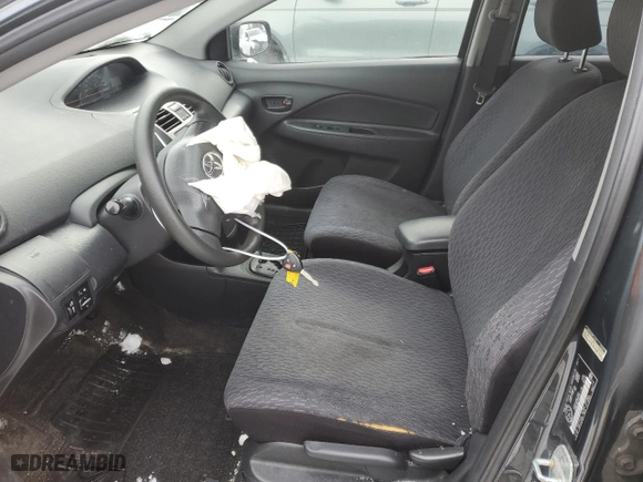 2011 Toyota Yaris with VIN JTDBT4K37B1411178, listed as a Copart auction lot 88942045 with 213,527 mi miles and Salvage Title. Bid and sale history available at carsss.com. Image 7.