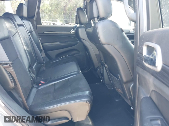 2020 Jeep Grand Cherokee Laredo E with VIN 1C4RJEAG3LC247027, listed as a IAAI auction lot 42538279 with 97,601 mi miles and . Bid and sale history available at DreamBid. Image 8.