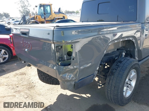 2020 Jeep Gladiator Rubicon with VIN 1C6JJTBG6LL149469, listed as a IAAI auction lot 42224826 with 58,870 mi miles and . Bid and sale history available at DreamBid. Image 6.