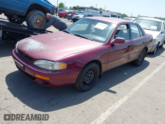 1996 Toyota Camry LE with VIN 4T1BF12K1TU129000, listed as a IAAI auction lot 42294535 with 157,851 mi miles and . Bid and sale history available at DreamBid. Image 2.