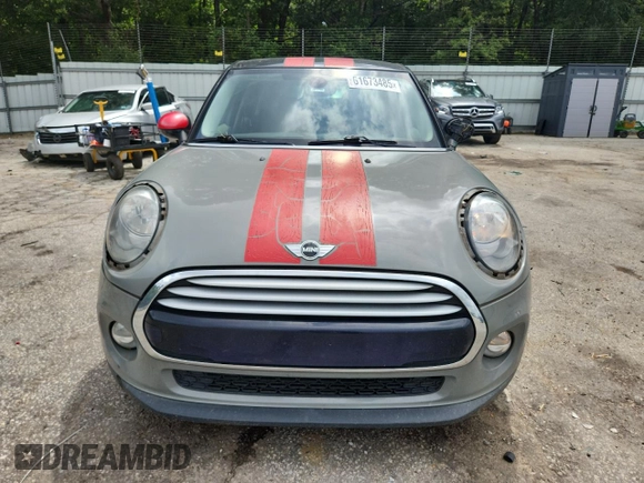 2015 MINI Hardtop 4 Door with VIN WMWXS5C5XFT831555, listed as a Copart auction lot 61673485 with 104,120 mi miles and Salvage title. Bid and sale history available at DreamBid. Image 5.