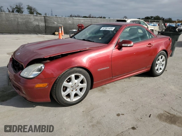 2001 Mercedes-Benz SLK 230 Kompressor with VIN WDBKK49F01F223928, listed as a Copart auction lot 87061404 with 102,270 mi miles and Salvage title. Bid and sale history available at DreamBid. Image 1.