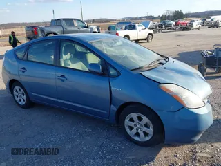 2009 Toyota Prius z VIN JTDKB20U897862579, wystawiony jako IAAI lot #41677737 z przebiegiem 125 880 mil mil oraz . Historia ofert i sprzedaży dostępna na DreamBid. Obrazek 1.