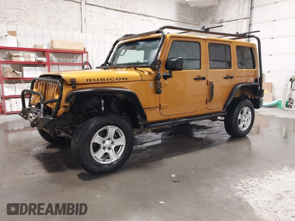 2014 Jeep Wrangler Unlimited Rubicon with VIN 1C4BJWFG7EL254534, listed as a IAAI auction lot 41279731 with 140,218 mi miles. Bid and sale history available at carsss.com. Image 17.