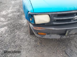 1995 Mazda B-Series Truck z VIN 4F4CR12A4STM06113, wystawiony jako IAAI lot #41674480 z przebiegiem 290 348 mil mil oraz . Historia ofert i sprzedaży dostępna na DreamBid. Obrazek 6.