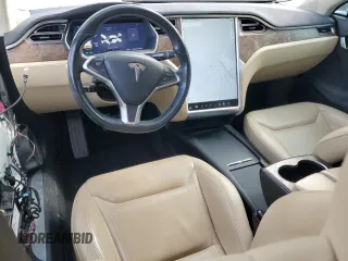 2016 Tesla Model S 90D with VIN 5YJSA1E27GF142380, listed as a Copart auction lot 50661905 with 104,865 mi miles and Salvage Title. Bid and sale history available at DreamBid. Image 8.