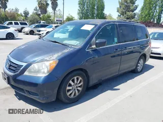 2009 Honda Odyssey EX-L with VIN 5FNRL386X9B409419, listed as a IAAI auction lot 42177197 with 190,827 mi miles. Bid and sale history available at carsss.com. Image 2.