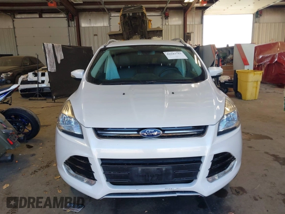 2016 Ford Escape Titanium with VIN 1FMCU9J94GUC28648, listed as a IAAI auction lot 42043761 with 82,509 mi miles and . Bid and sale history available at DreamBid. Image 12.