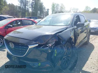 2023 Mazda CX-9 Touring Plus with VIN JM3TCBAY9P0657854, listed as a IAAI auction lot 41931409 with 54,036 mi miles and . Bid and sale history available at DreamBid. Image 17.