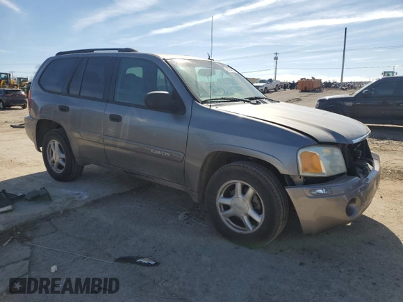 2005 GMC Envoy SLE z VIN 1GKDT13SX52364812, wystawiony jako Copart lot #46224955 z przebiegiem 183 441 mil mil oraz Szkoda całkowita • Salvage title. Historia ofert i sprzedaży dostępna na DreamBid. Obrazek 4.