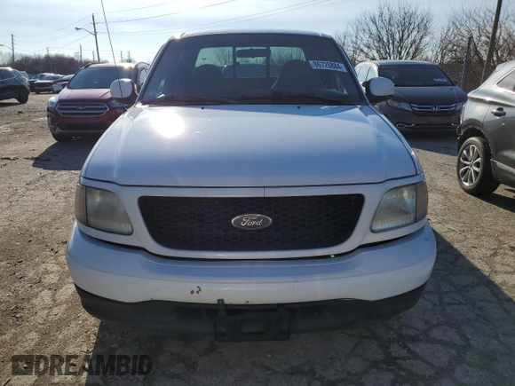 2000 Ford F-150 XL with VIN 1FTRX17L8YNB40935, listed as a Copart auction lot 86726884 with 260,636 mi miles and Salvage Title. Bid and sale history available at carsss.com. Image 5.