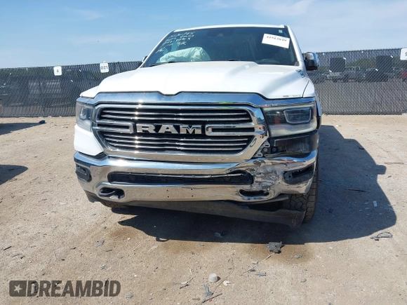 2023 Ram 1500 Laramie with VIN 1C6SRFJT0PN508550, listed as a IAAI auction lot 41913849 with 57,765 mi miles and . Bid and sale history available at DreamBid. Image 6.
