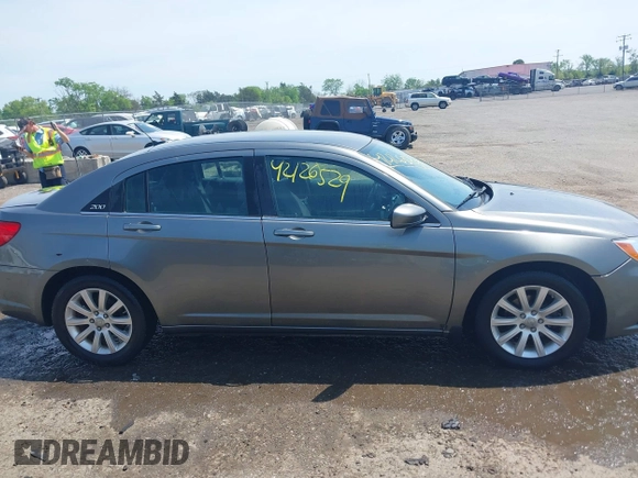 2012 Chrysler 200 Touring with VIN 1C3CCBBGXCN326023, listed as a IAAI auction lot 42126529 with 163,325 mi miles and . Bid and sale history available at carsss.com. Image 13.