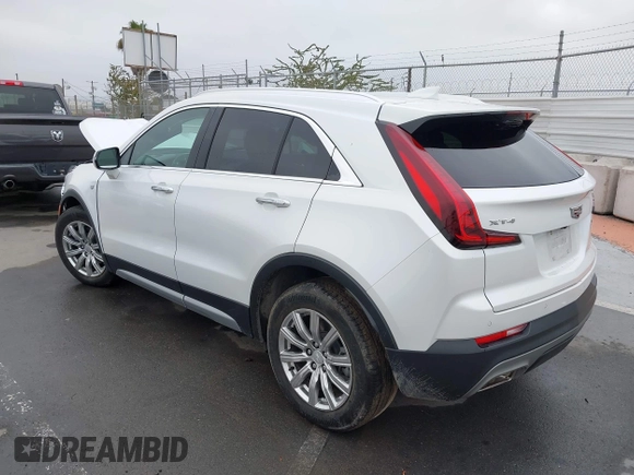 2022 Cadillac XT4 FWD Premium Luxury with VIN 1GYFZCR49NF100393, listed as a IAAI auction lot 42497187 with 23,672 mi miles and . Bid and sale history available at DreamBid. Image 3.