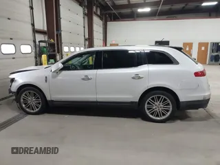 2013 Lincoln MKT EcoBoost with VIN 2LMHJ5AT3DBL56954, listed as a IAAI auction lot 41705877 with 148,771 mi miles. Bid and sale history available at carsss.com. Image 14.