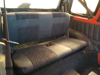 1995 Chevrolet Tracker z VIN 2CNBJ186XS6926688, wystawiony jako Copart lot #77487204 z przebiegiem 17 598 mil mil oraz Szkoda całkowita • Salvage title. Historia ofert i sprzedaży dostępna na DreamBid. Obrazek 10.
