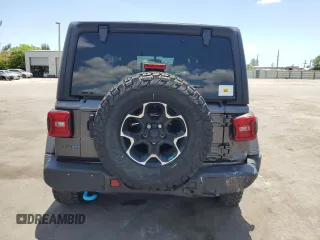 2023 Jeep Wrangler Rubicon z VIN 1C4JJXR65PW557849, wystawiony jako Copart lot #57845705 z przebiegiem 21 849 mil mil oraz Szkoda całkowita • Salvage title. Historia ofert i sprzedaży dostępna na DreamBid. Obrazek 6.