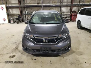 2020 Honda Fit EX z VIN 3HGGK5H84LM700266, wystawiony jako Copart lot #47895033 z przebiegiem 19 294 mil mil oraz . Historia ofert i sprzedaży dostępna na DreamBid. Obrazek 5.