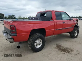 2000 Dodge Ram 2500 with VIN 1B7KF236XYJ100955, listed as a Copart auction lot 70304884 with 250,592 mi miles and Salvage Title. Bid and sale history available at carsss.com. Image 3.