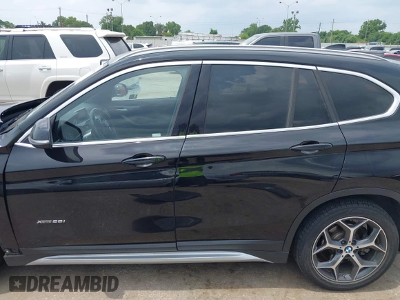 2017 BMW X1 xDrive28i with VIN WBXHT3Z34H4A53528, listed as a IAAI auction lot 42429800 with 75,986 mi miles and . Bid and sale history available at DreamBid. Image 14.