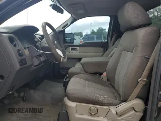 2010 Ford F-150 XL with VIN 1FTMF1CW1AKC09582, listed as a Copart auction lot 54296315 with 127,439 mi miles and Salvage title. Bid and sale history available at DreamBid. Image 7.