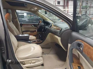 2012 Buick Enclave Leather with VIN 5GAKVCED4CJ223097, listed as a IAAI auction lot 42053378 with 125,036 mi miles and . Bid and sale history available at carsss.com. Image 5.