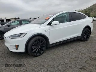 2016 Tesla Model X 70D with VIN 5YJXCBE27GF007289, listed as a Copart auction lot 53876475 with 67,320 mi miles and Salvage Title. Bid and sale history available at DreamBid. Image 1.
