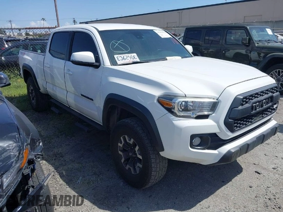 2021 Toyota Tacoma 4WD SR5 with VIN 3TMDZ5BN7MM103321, listed as a IAAI auction lot 41765512 with 49,009 mi miles. Bid and sale history available at carsss.com. Image 1.