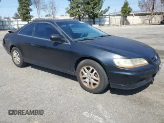 2001 Honda Accord EX с VIN 1HGCG22551A022831, выставлен на аукционе Copart как лот 52011585 с пробегом 248 025 миль миль и Списание • Salvage title. История ставок и продаж доступна на DreamBid. Изображение 4.