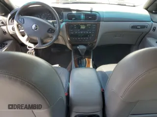 2001 Mercury Sable LS Premium z VIN 1MEFM55S41G624039, wystawiony jako Copart lot #58792965 z przebiegiem 64 068 mil mil oraz Szkody całkowita. Historia ofert i sprzedaży dostępna na DreamBid. Obrazek 8.