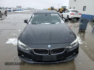 2015 BMW 4 Series 428i xDrive with VIN WBA4C9C54FD330601, listed as a Copart auction lot 45168955 with 112,408 mi miles and Salvage title. Bid and sale history available at DreamBid. Image 5.