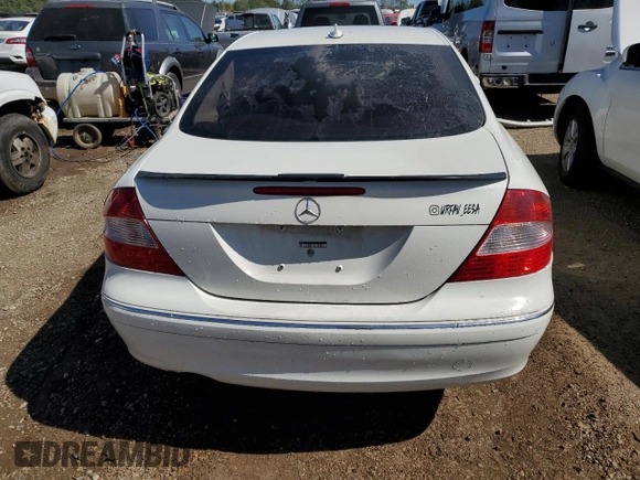 2009 Mercedes-Benz CLK-Class 3.5L with VIN WDBTJ56H09F261819, listed as a Copart auction lot 70021184 with 130,976 mi miles and Salvage Title. Bid and sale history available at carsss.com. Image 6.