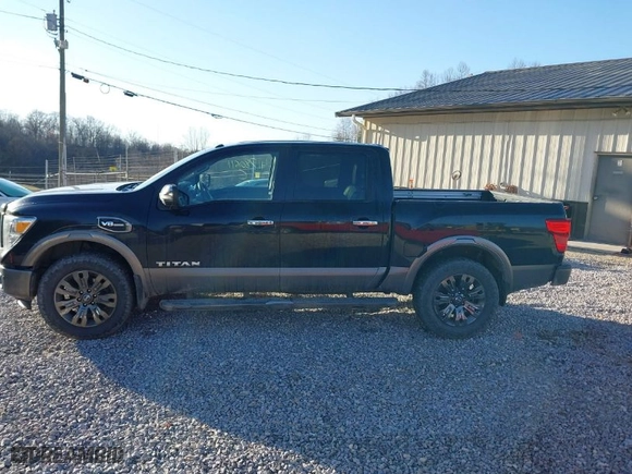 2017 Nissan Titan SV with VIN 1N6AA1E57HN516363, listed as a IAAI auction lot 41780611 with 114,749 mi miles. Bid and sale history available at carsss.com. Image 15.