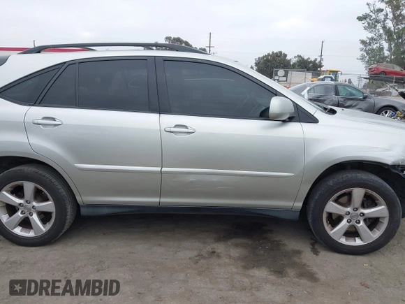 2005 Lexus RX 330 z VIN JTJHA31U250079436, wystawiony jako IAAI lot #42379567 z przebiegiem 180 626 mil mil oraz . Historia ofert i sprzedaży dostępna na DreamBid. Obrazek 13.