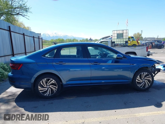 2021 Volkswagen Jetta SEL with VIN 3VWE57BUXMM050386, listed as a IAAI auction lot 42140492 with 74,477 mi miles and . Bid and sale history available at DreamBid. Image 14.