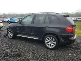 2012 BMW X5 35i with VIN 5UXZV4C57CL765053, listed as a Copart auction lot 59997275 with 157,943 mi miles and Salvage title. Bid and sale history available at DreamBid. Image 2.