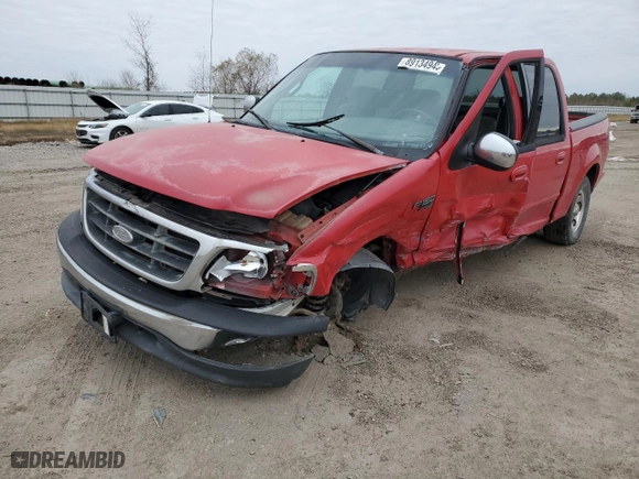 2001 Ford F-150 SuperCrew XLT with VIN 1FTRW07W41KF76325, listed as a Copart auction lot 89134945 with 262,868 mi miles and Salvage Title. Bid and sale history available at carsss.com. Image 1.