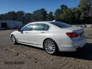 2016 BMW 7 Series 740i with VIN WBA7E2C54GG547970, listed as a Copart auction lot 71097393 with 60,464 mi miles. Bid and sale history available at carsss.com. Image 2.