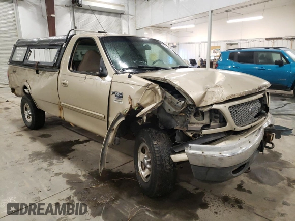 1999 Ford F-150 z VIN 1FTRF18W5XKB44503, wystawiony jako Copart lot #82359574 z przebiegiem 272 265 mil mil oraz Szkoda całkowita • Salvage title. Historia ofert i sprzedaży dostępna na DreamBid. Obrazek 4.