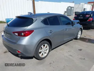 2015 Mazda 3 i Touring with VIN 3MZBM1L75FM224525, listed as a IAAI auction lot 41692928 with 57,803 mi miles and . Bid and sale history available at carsss.com. Image 4.