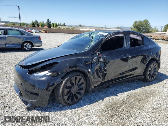 2022 Tesla Model Y Performance z VIN 7SAYGDEF0NF540933, wystawiony jako Copart lot #56087145 z przebiegiem 59 717 mil mil oraz Szkoda całkowita • Salvage title. Historia ofert i sprzedaży dostępna na DreamBid. Obrazek 1.