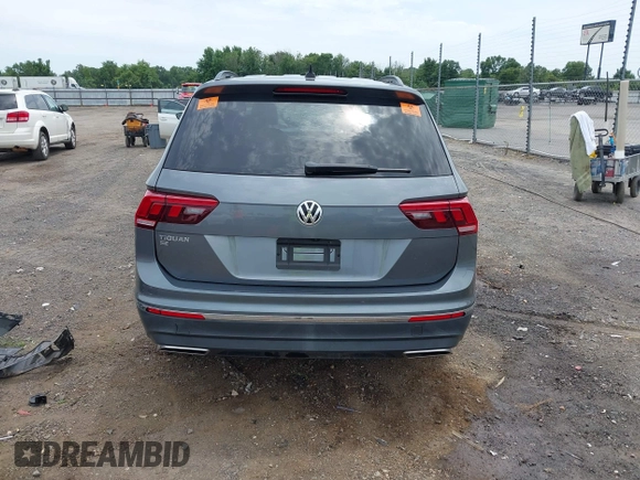 2021 Volkswagen Tiguan SE z VIN 3VV3B7AX8MM159316, wystawiony jako IAAI lot #42525546 z przebiegiem 70 141 mil mil oraz . Historia ofert i sprzedaży dostępna na DreamBid. Obrazek 16.
