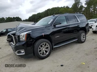 2017 GMC Yukon SLT with VIN 1GKS2BKC2HR406007, listed as a Copart auction lot 71702084 with 66,828 mi miles and Salvage Title. Bid and sale history available at carsss.com. Image 1.